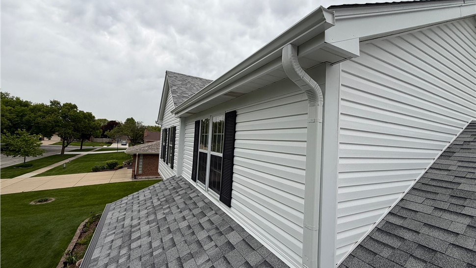 Gutters, Roofing, Siding Project in Darien, Illinois by Huskie Exteriors