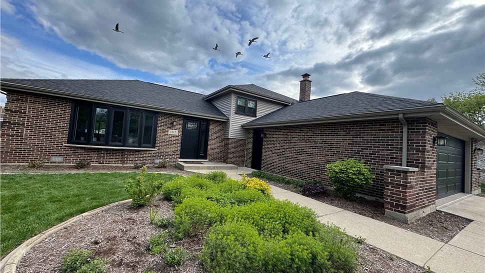 Gutters, Roofing, Windows Project in Woodridge, Illinois by Huskie Exteriors