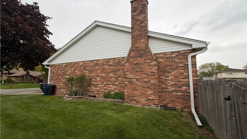 Gutters, Roofing, Siding Project in Darien, Illinois by Huskie Exteriors