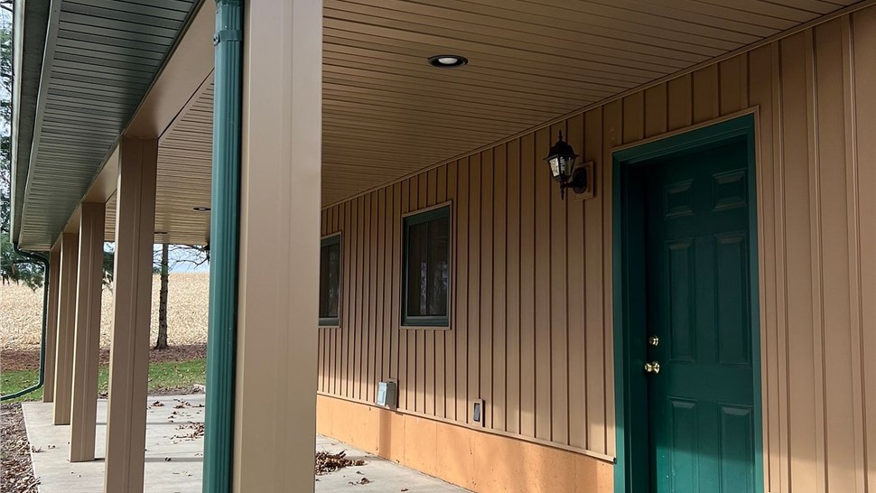 Gutters, Siding Project in Rockford, IL by Huskie Exteriors