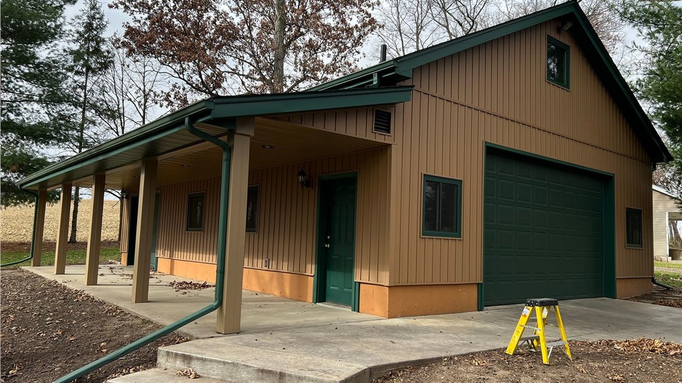 Gutters, Siding Project in Rockford, IL by Huskie Exteriors