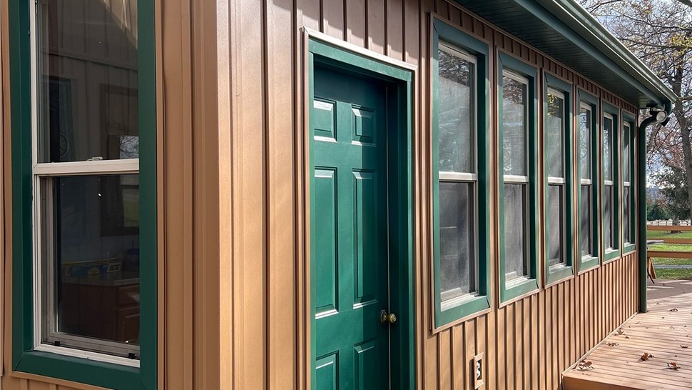 Gutters, Siding Project in Rockford, IL by Huskie Exteriors