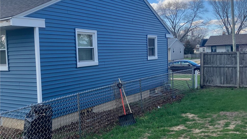 Gutters, Siding Project in Loves Park, Illinois by Huskie Exteriors
