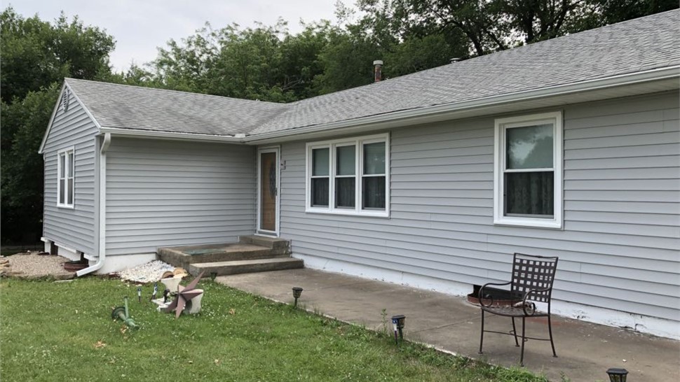 Gutters, Siding Project in Harrisonville, MO by Integrity Roofing LLC