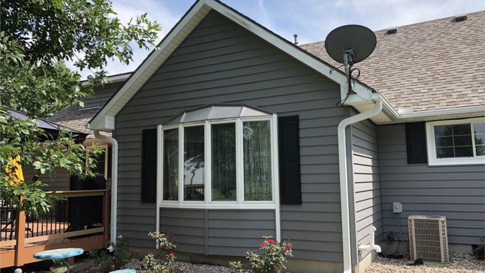 Gutters, Siding, Windows Project in Kingsville, MO by Integrity Roofing LLC