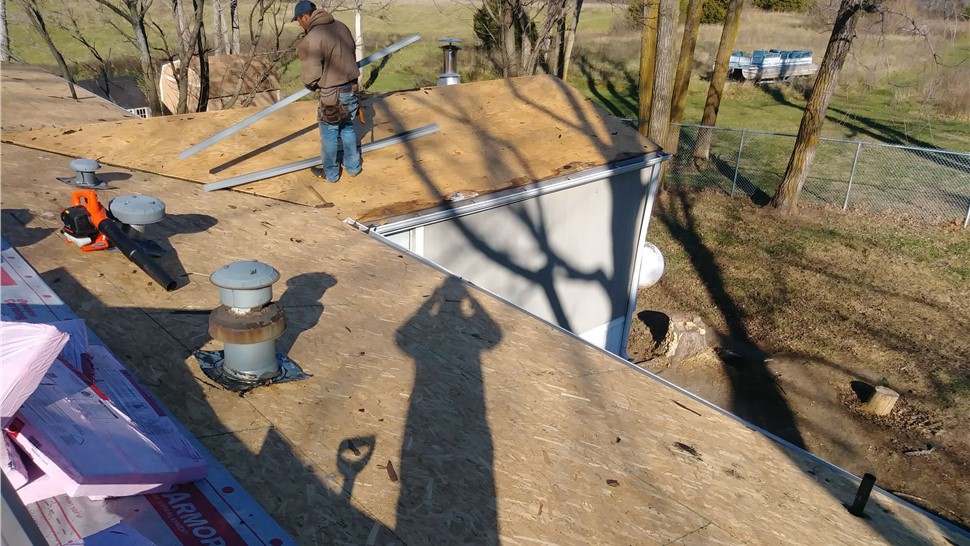 Gutters, Roofing, Siding Project in Peculiar, MO by Integrity Roofing LLC