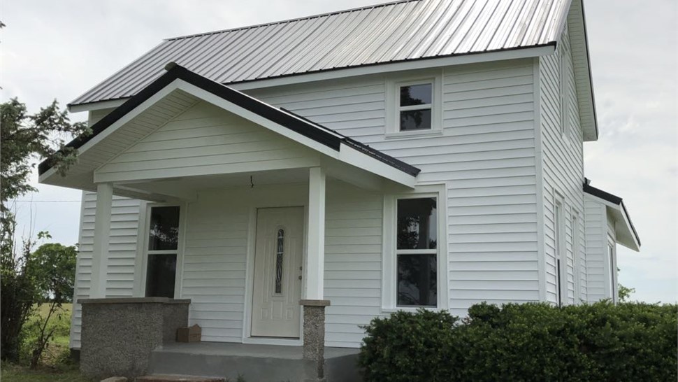 Gutters, Siding, Windows Project in Appleton City, MO by Integrity Roofing LLC