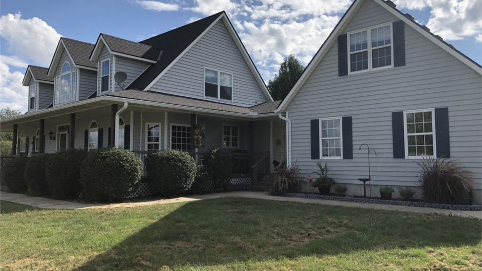 Doors, Gutters, Siding, Windows Project in Drexel, MO by Integrity Roofing LLC