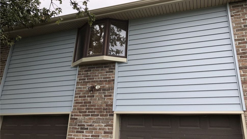 Gutters, Siding Project in Centerview, MO by Integrity Roofing LLC