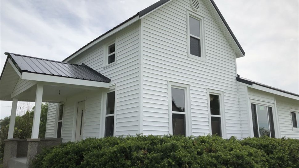 Gutters, Siding, Windows Project in Appleton City, MO by Integrity Roofing LLC