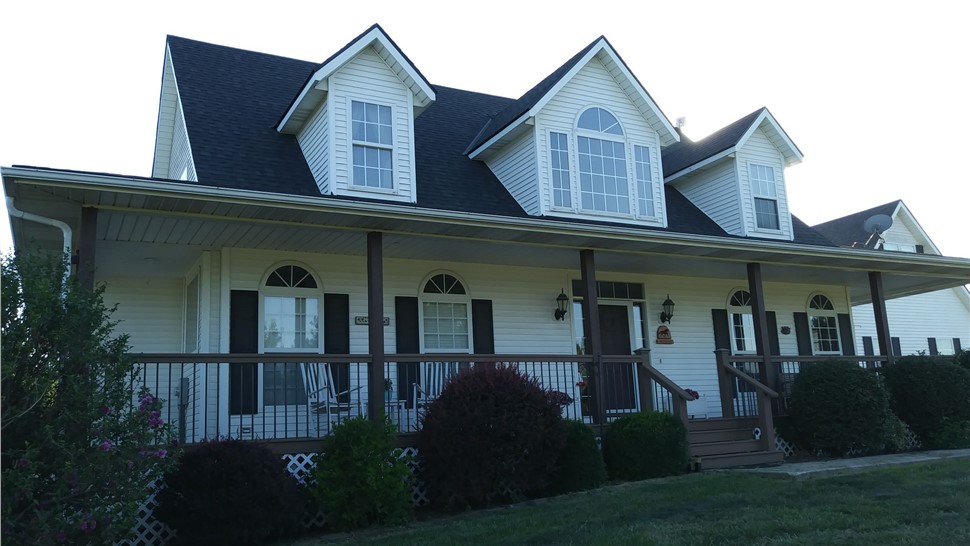 Doors, Gutters, Siding, Windows Project in Drexel, MO by Integrity Roofing LLC