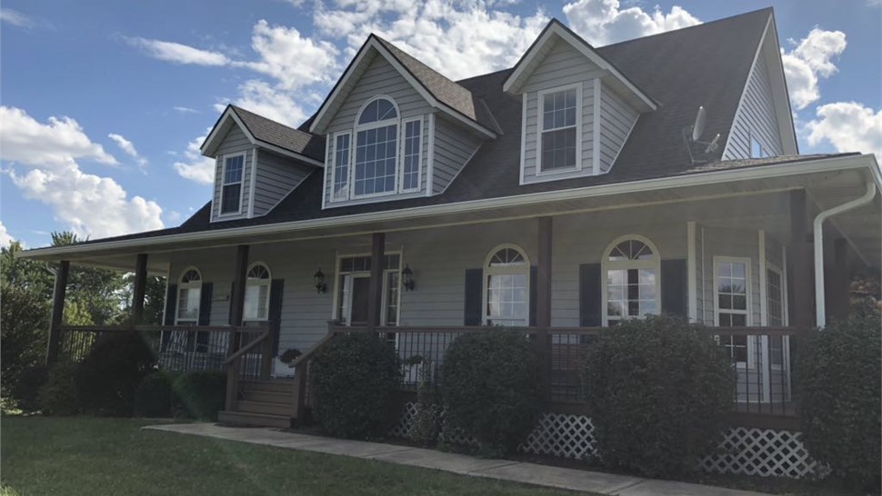Doors, Gutters, Siding, Windows Project in Drexel, MO by Integrity Roofing LLC