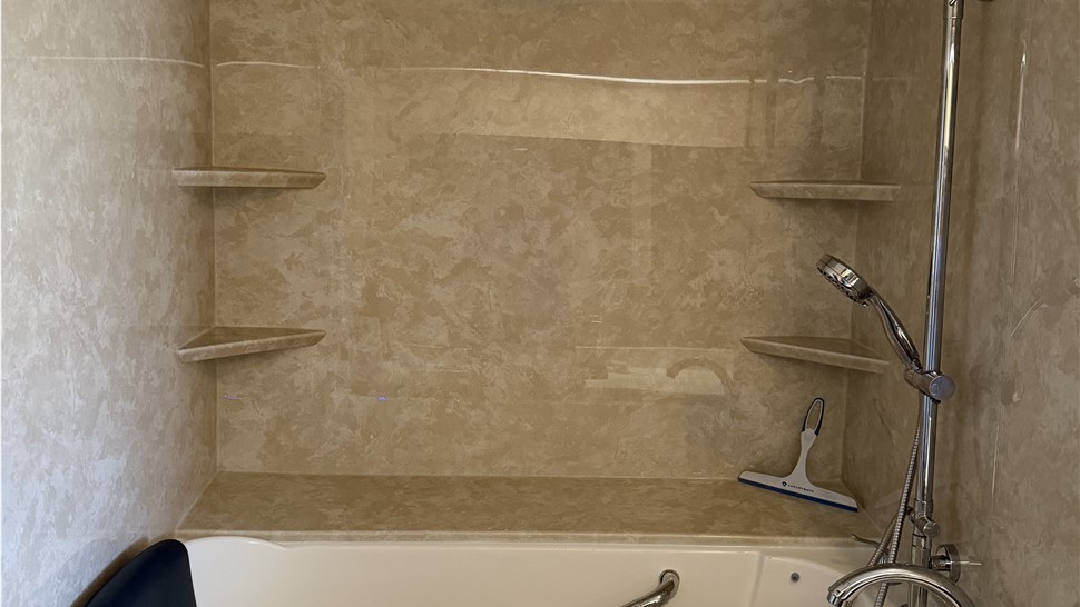 Completed walk-in tub conversion in Iowa Park TX with acrylic surround