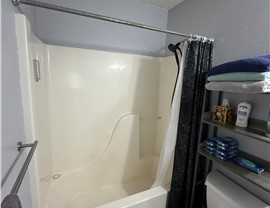 Before photo of Wichita Falls TX tub-shower combo prior to bath-to-shower conversion.