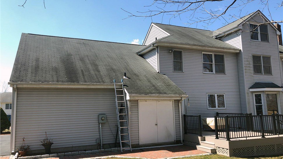 New roof and gutter installation on a home in Rocky Hill CT completed by Millstream Construction.