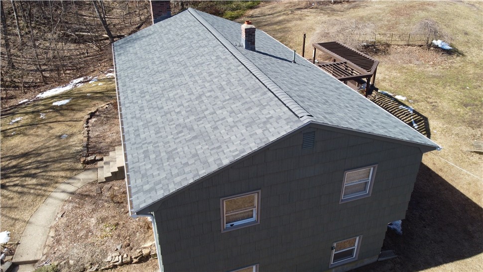 Architectural shingle roof replacement on a home in Marlborough, CT completed by Millstream Construction.