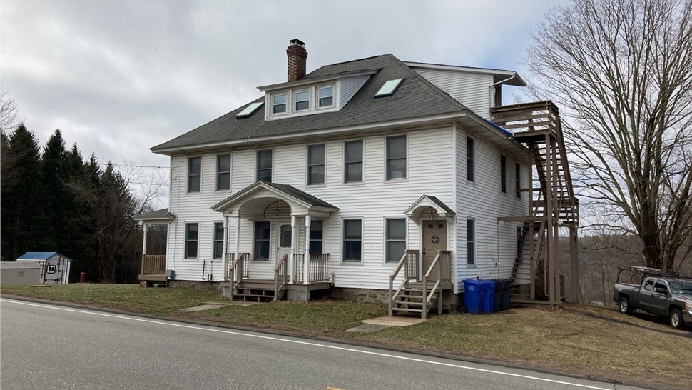 Before photo of roof replacement project in Willington CT showing original roof condition.
