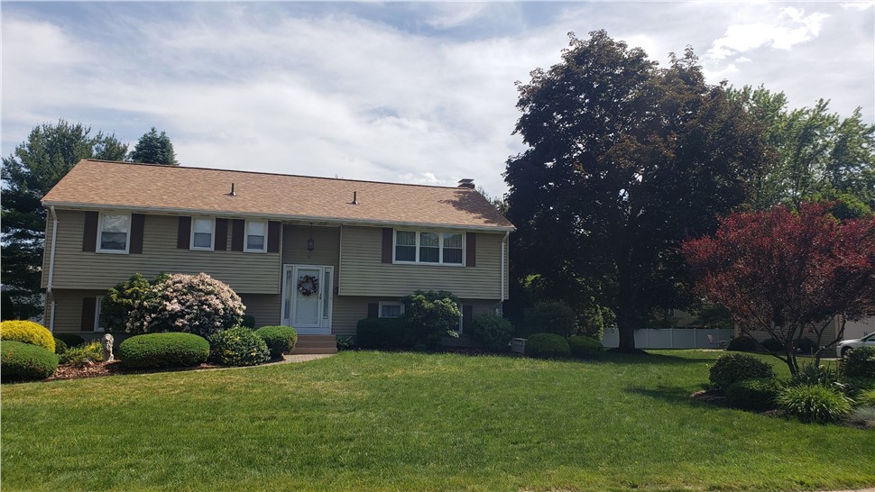Restored roof by Millstream Construction Manchester CT home with fresh finish