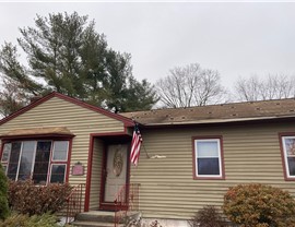 Newington CT roof replacement with old solar panels removed and new architectural shingles installed.