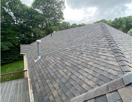 Millstream Construction new asphalt roof on Manchester CT home after replacement