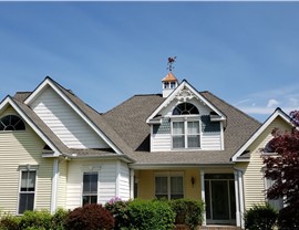 New architectural shingle roof installed on a Colonial home in South Windsor, CT by Millstream Construction.