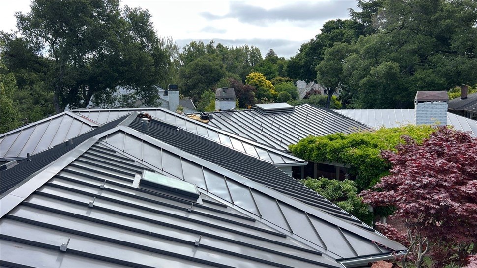 After photo of new standing seam metal roof with solar panels in Hillsborough CA