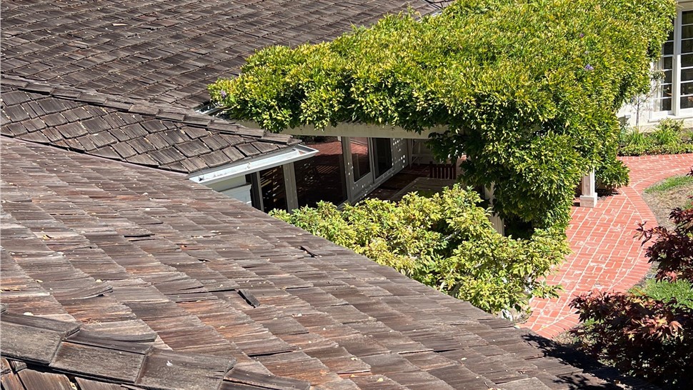 Before photo of old cedar shake roof in Hillsborough CA prior to metal roof installation