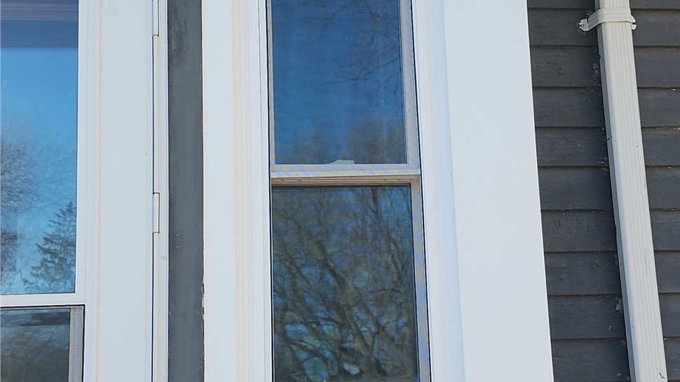 Seamless Gutters, Windows Project in Dakota City, IA by Midwest Construction