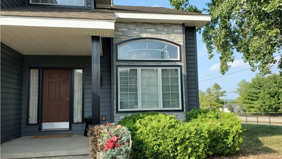 Seamless Gutters, Siding, Windows Project in Johnston, IA by Midwest Construction