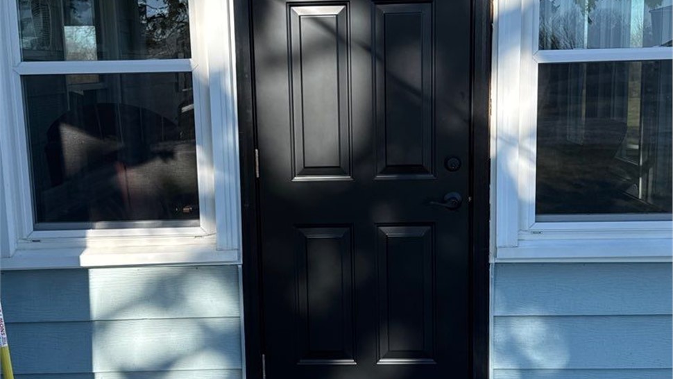 Doors, Siding Project in Runnells, IA by Midwest Construction