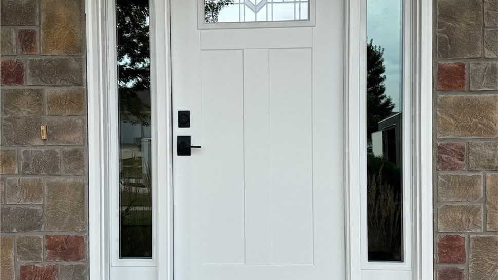 Decks, Doors, Manufactured Stone Siding, Siding Project in Waukee, IA by Midwest Construction