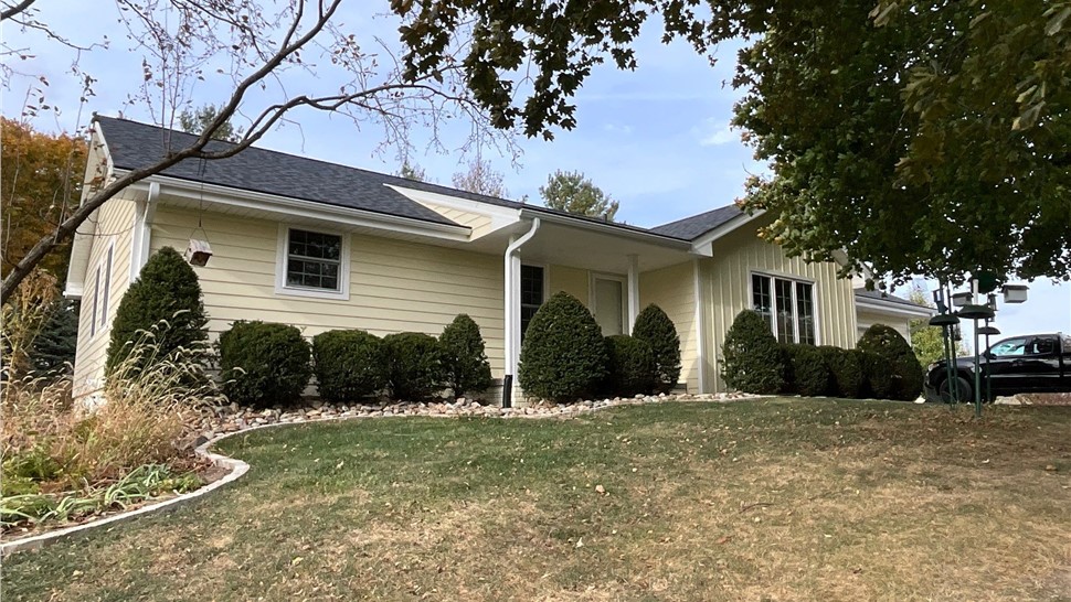 Decks, Seamless Gutters, Siding Project in Norwalk, IA by Midwest Construction