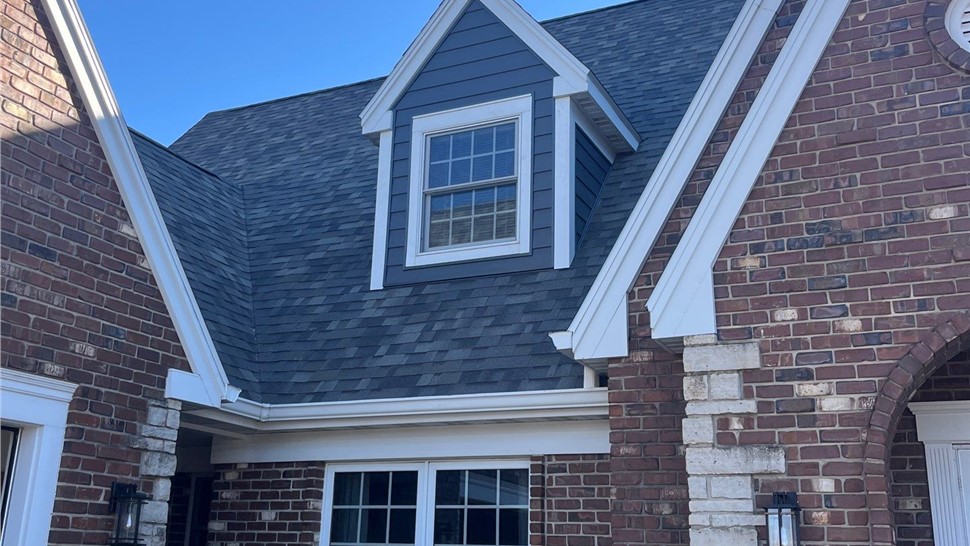 Seamless Gutters, Siding Project in Mason City, IA by Midwest Construction