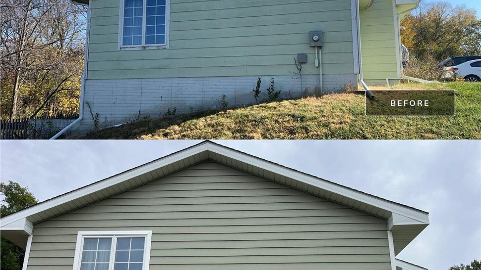 Seamless Gutters, Siding Project in Carlisle, IA by Midwest Construction