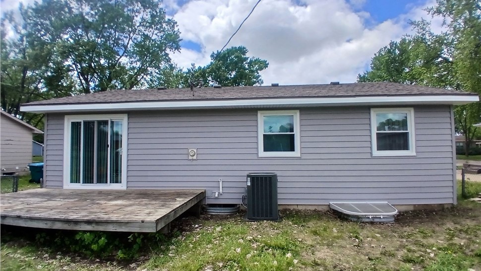 Seamless Gutters, Siding Project in Ankeny, IA by Midwest Construction