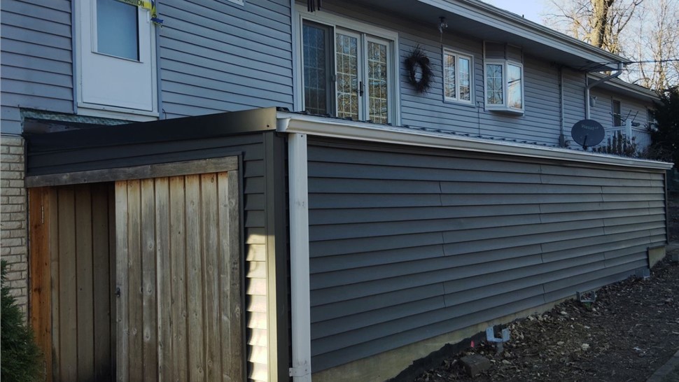 Siding, Sunrooms Project in Newton, IA by Midwest Construction