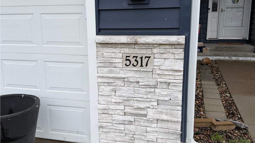 Seamless Gutters Project in Urbandale, IA by Midwest Construction