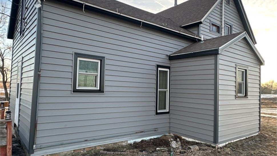 Seamless Gutters, Siding, Windows Project in Iowa Falls, IA by Midwest Construction