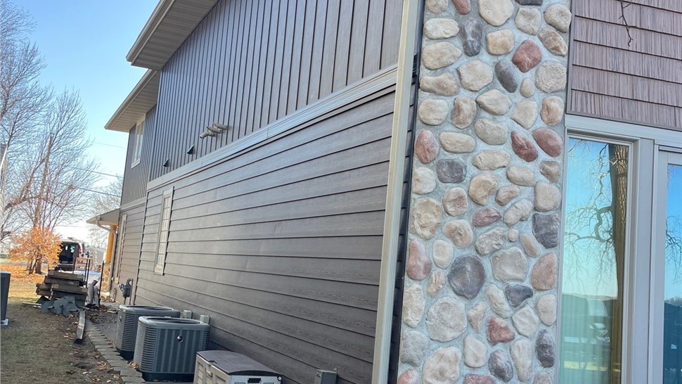 Manufactured Stone Siding, Roofing, Siding Project in Clear Lake, IA by Midwest Construction