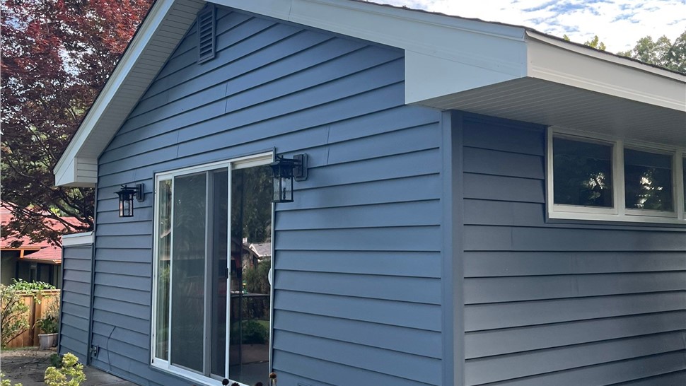 Seamless Gutters, Siding Project in West Des Moines, IA by Midwest Construction