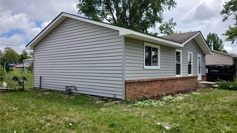 Seamless Gutters, Siding Project in Ankeny, IA by Midwest Construction