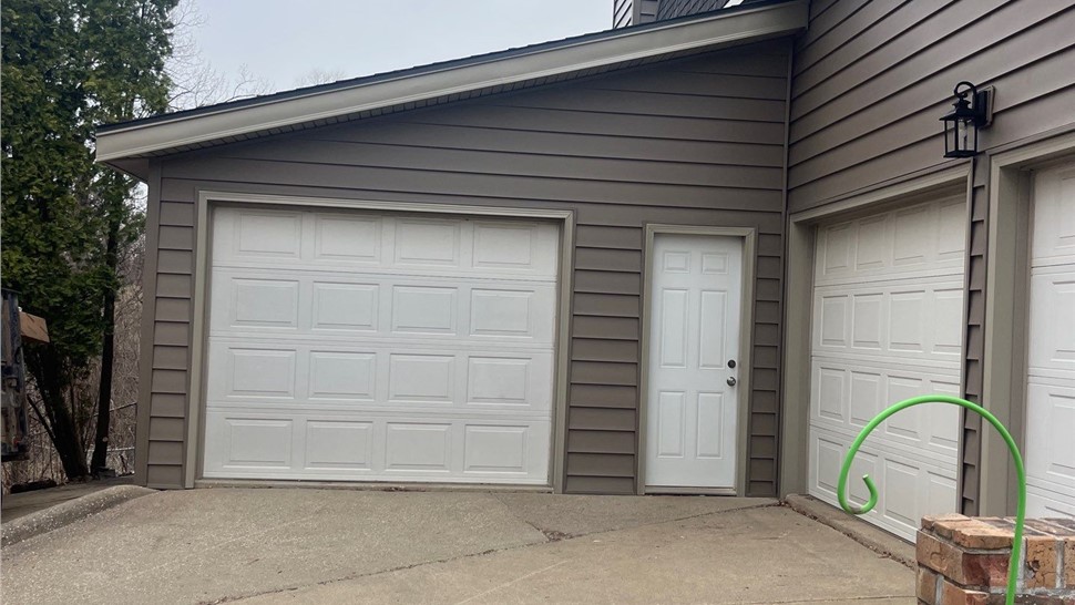 Seamless Gutters Project in Waukee, IA by Midwest Construction