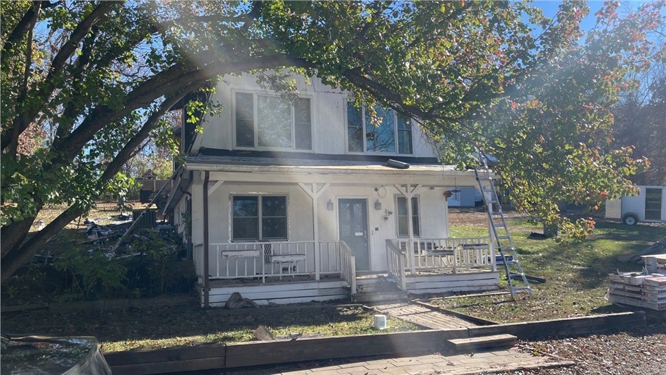 Roofing, Seamless Gutters, Siding, Sunrooms, Windows Project in Knoxville, IA by Midwest Construction