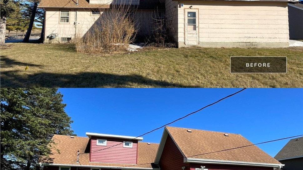 Seamless Gutters, Siding, Windows Project in Roland, IA by Midwest Construction