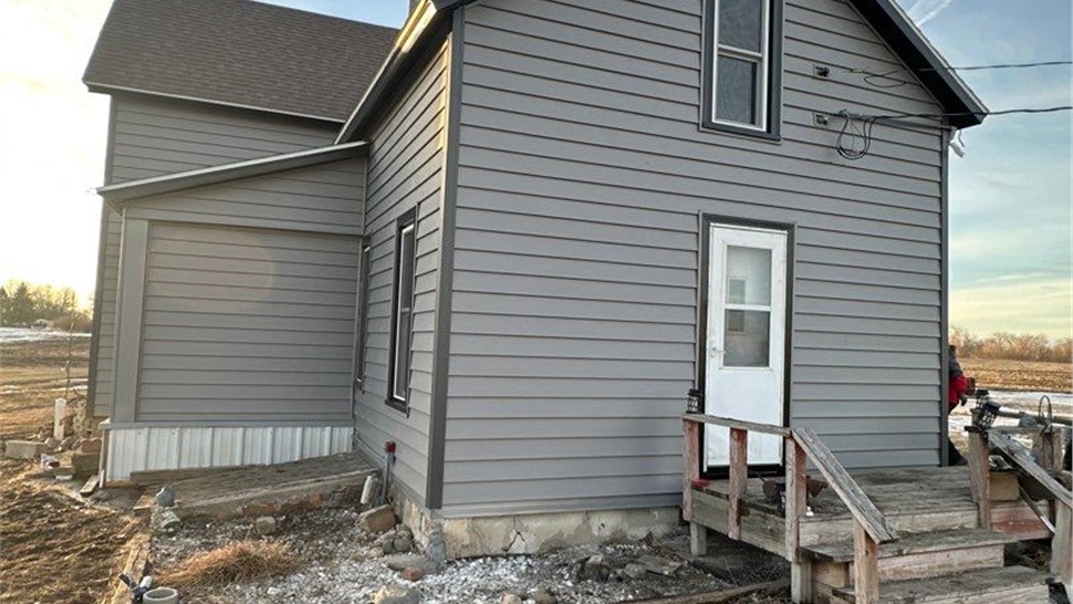 Seamless Gutters, Siding, Windows Project in Iowa Falls, IA by Midwest Construction