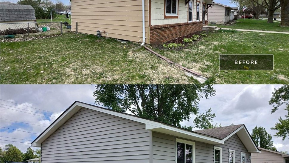 Seamless Gutters, Siding Project in Ankeny, IA by Midwest Construction