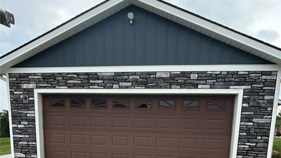 Manufactured Stone Siding Project in Eddyville, IA by Midwest Construction