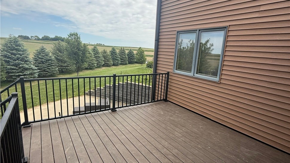 Seamless Gutters, Siding Project in Harlan, IA by Midwest Construction