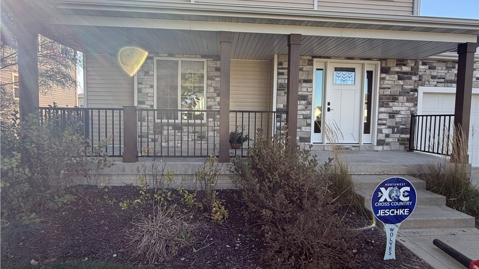 Decks, Doors, Manufactured Stone Siding, Siding Project in Waukee, IA by Midwest Construction