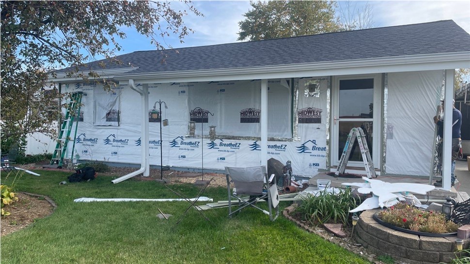 Seamless Gutters, Siding Project in Huxley, IA by Midwest Construction